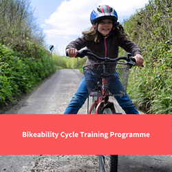 a child riding their bike, text reads "bikeability cycle training programme"