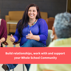 image of a woman smiling and talking sat on a chair at school, text reads "build relationships, work with and support your Whole School Community"