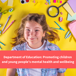 young girl smiling whilst lying on floor with craft items, text reads "prmoting young peoples mental health and wellbeing"